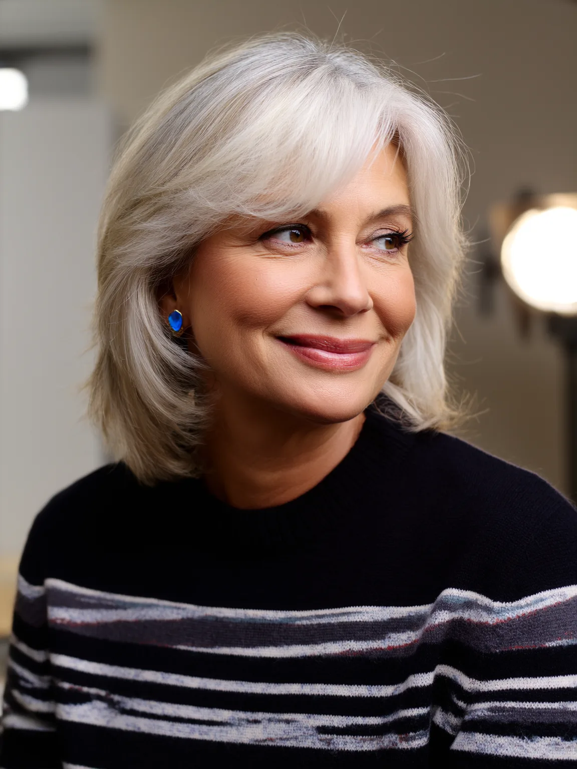 Sleek Silver Frost Shoulder-Length Feathered Layers with Side Bangs